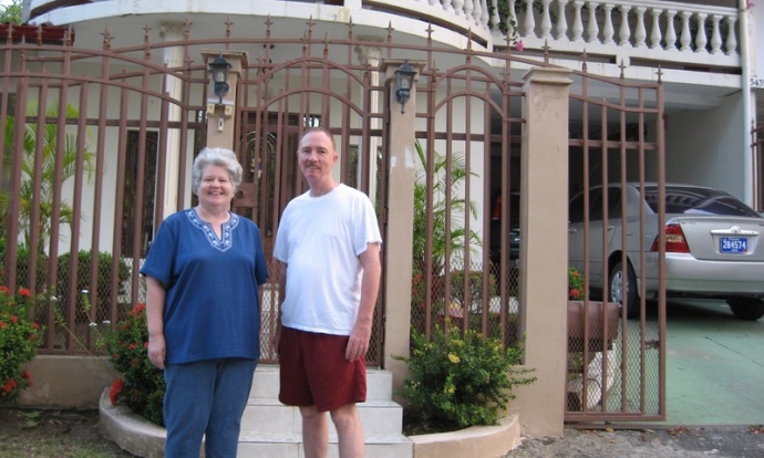 Cyndy with her old friend Jim outside his house in Diablo, Panama