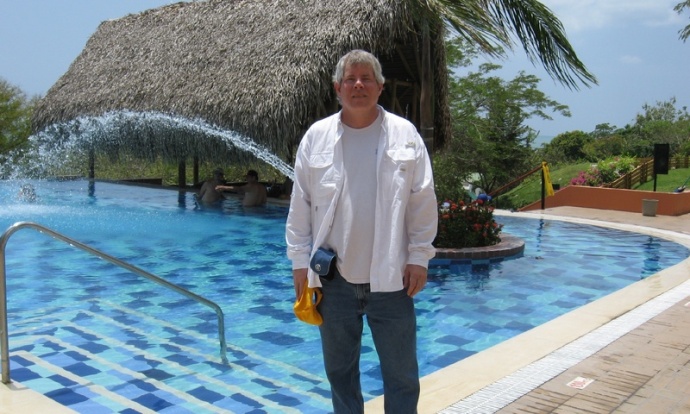 Me enjoying the resort - plenty of big pools an private, kayaking off the beach, all the food you could eat...