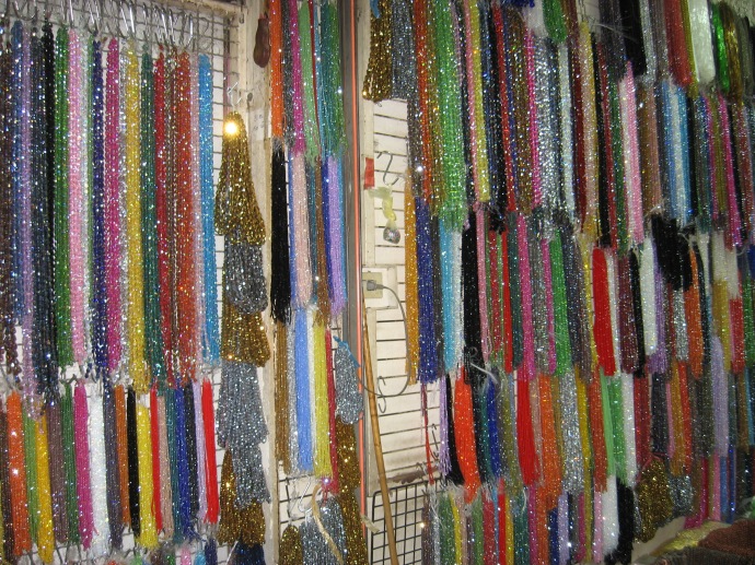 strung necklace beads in market store