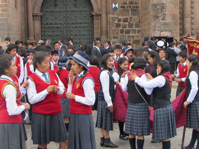 Cusco girls chatting before parade