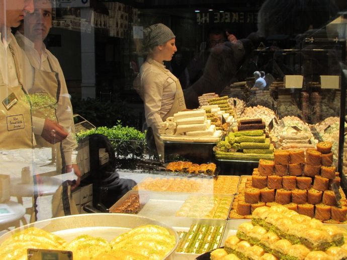 Girl selling baklava and Turkish Delight in Grand Bazaar