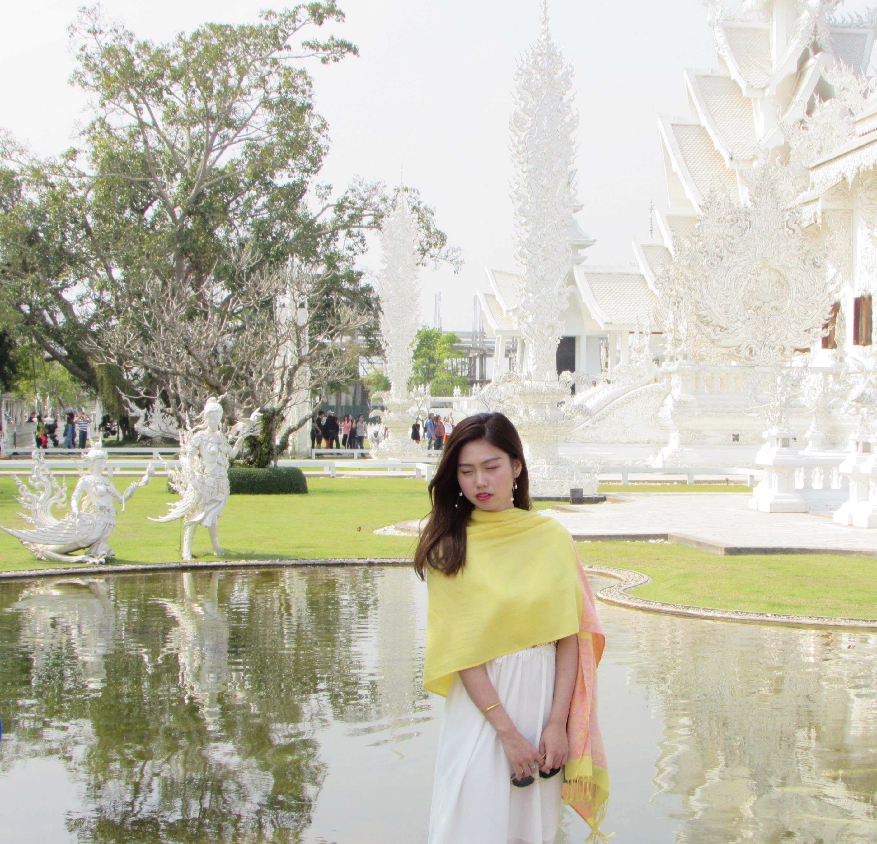 yellow girl white temple Chiang Rai